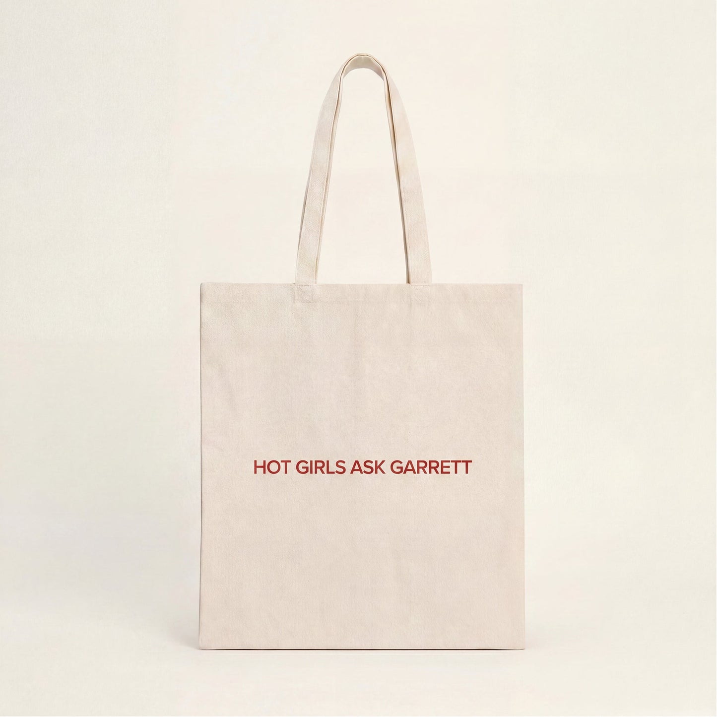 Hot Girls Ask Garrett cotton tote bag carried as hockey romance merch