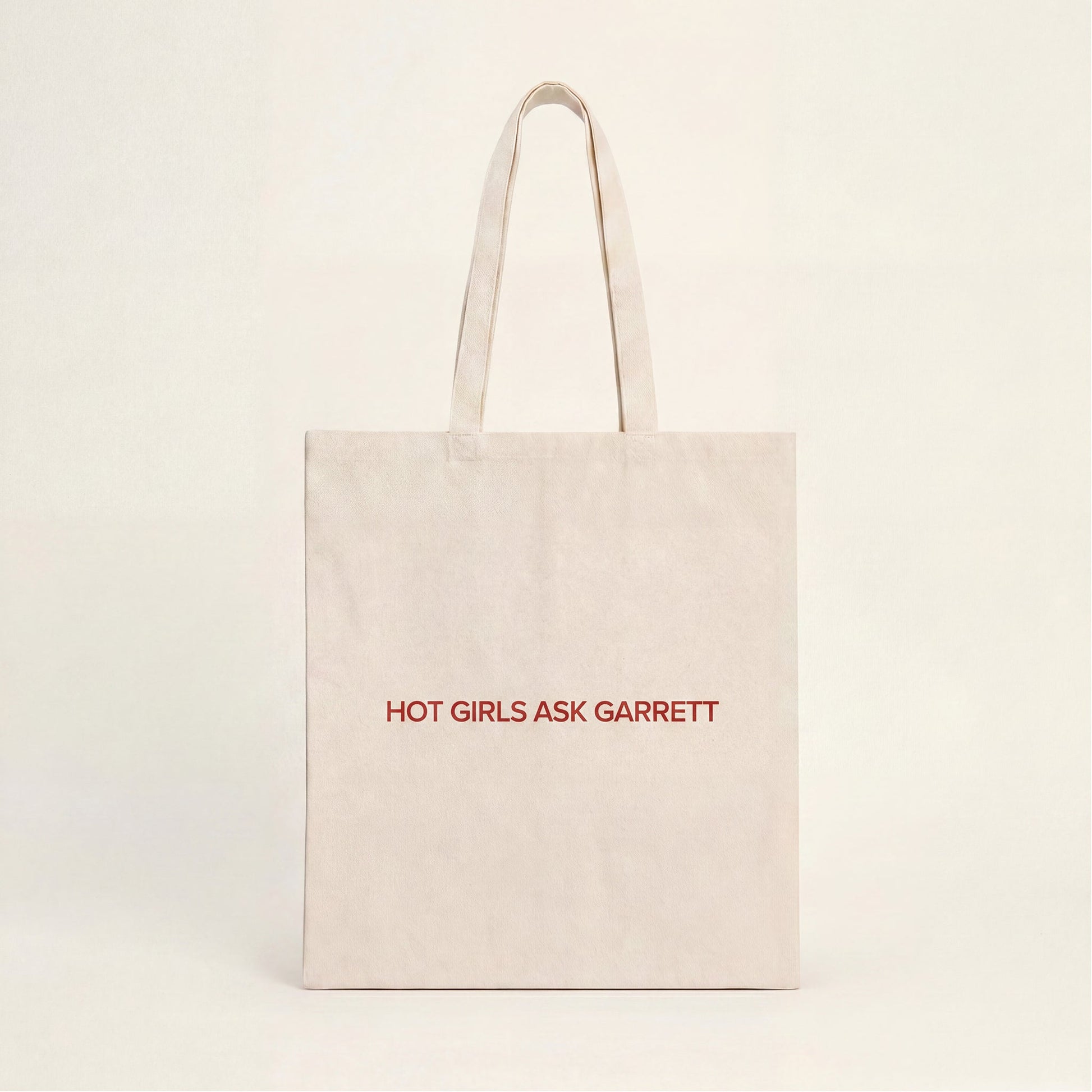Hot Girls Ask Garrett cotton tote bag carried as hockey romance merch