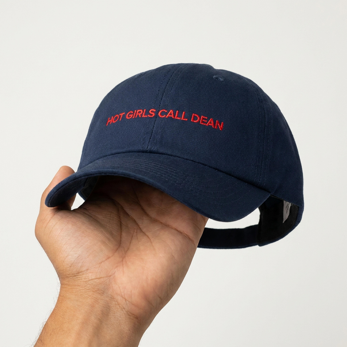 Close-up of the Hot Girls Call Dean embroidery on the dad cap