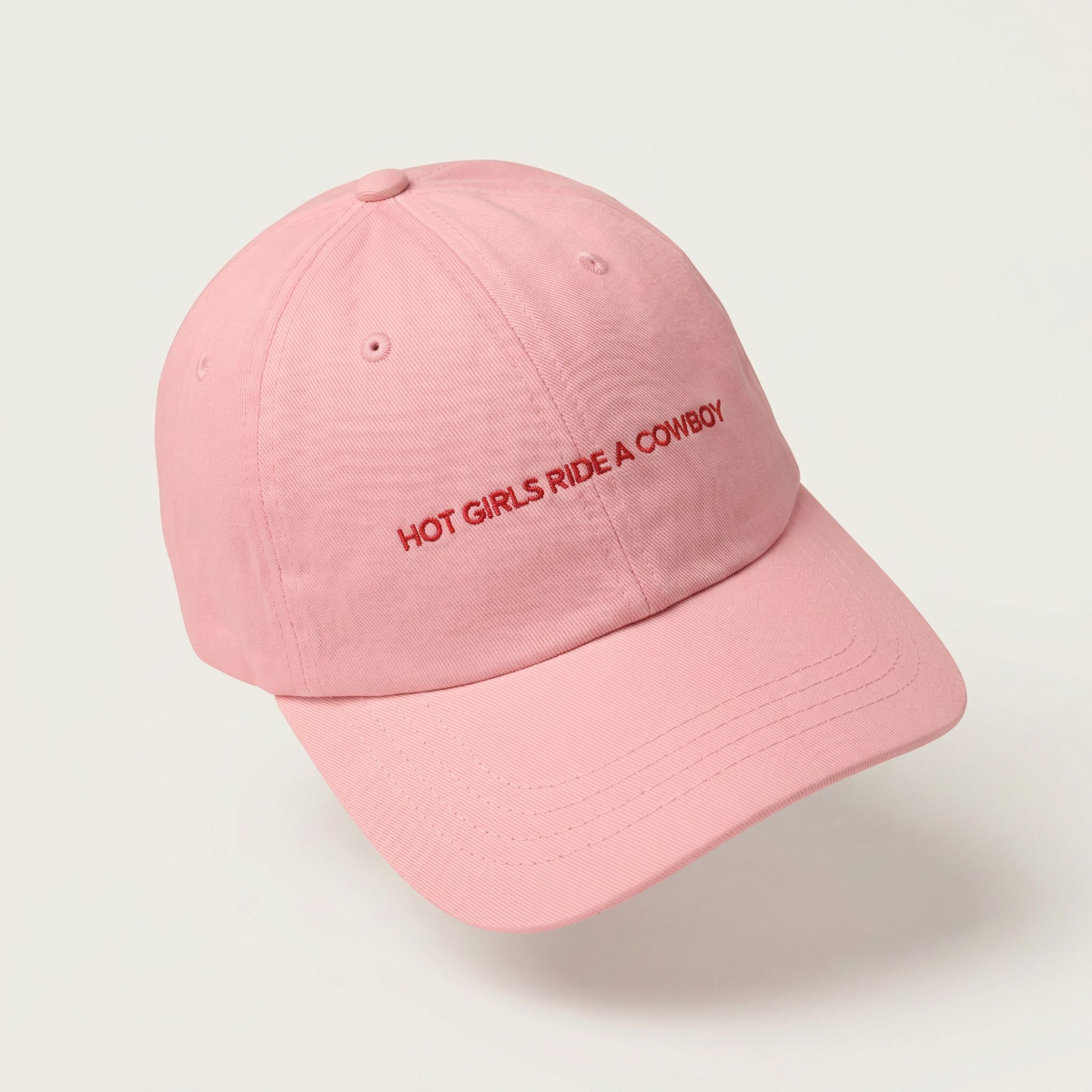 Hot Girls Ride a Cowboy embroidered dad cap in brand red, cowboy romance merch by After Hours Book Club