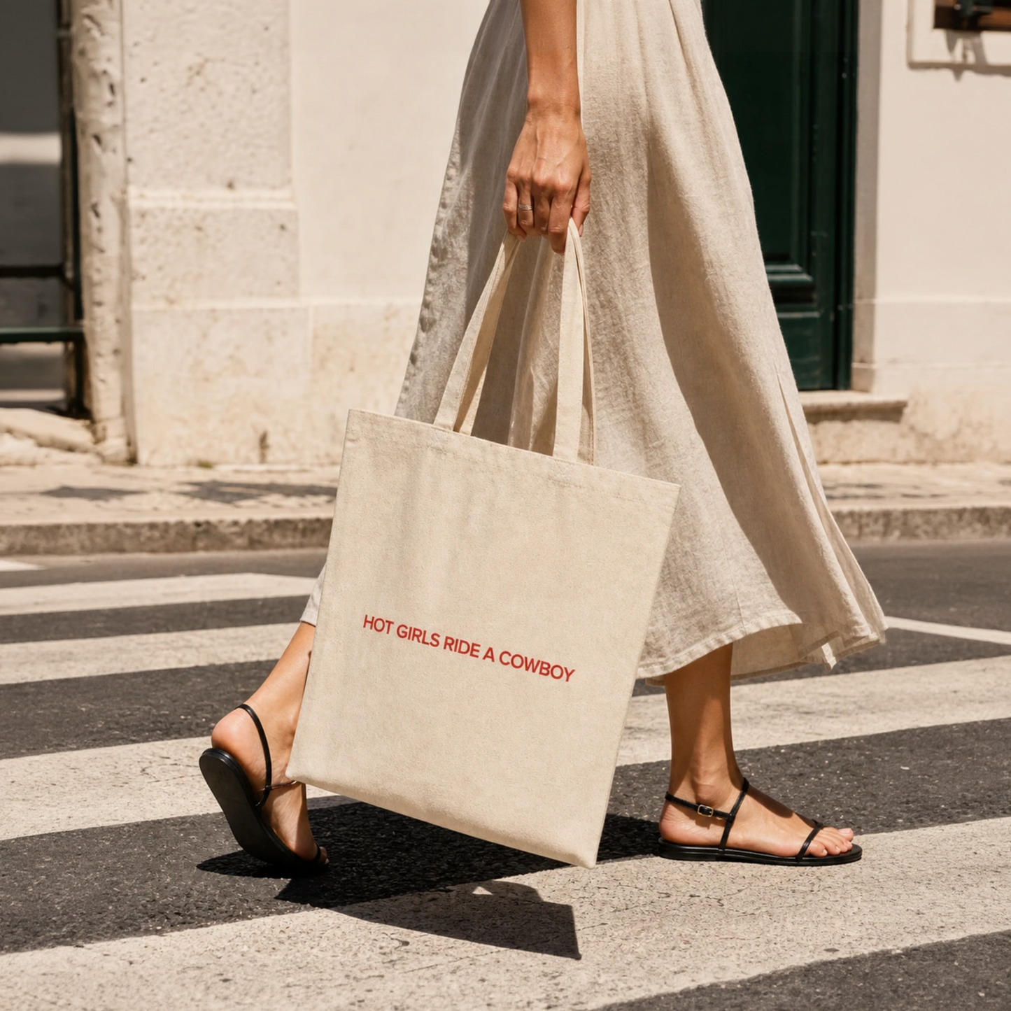Hot Girls Ride a Cowboy tote bag carried on the street